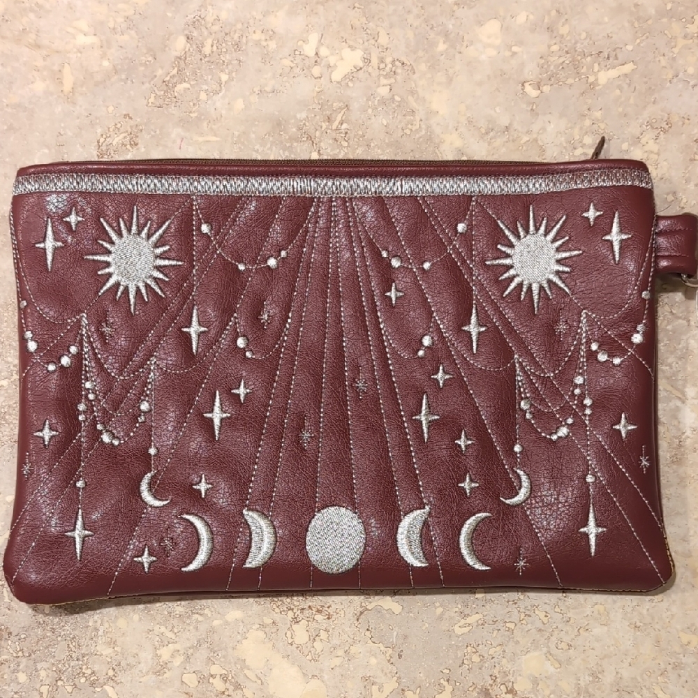 Elegant Burgundy Clutch with Silver Celestial Design